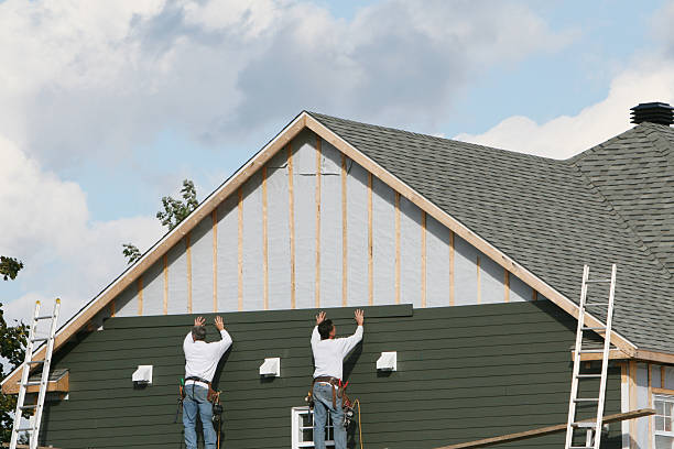 Professional Siding Replacement technician working in Plano, IL